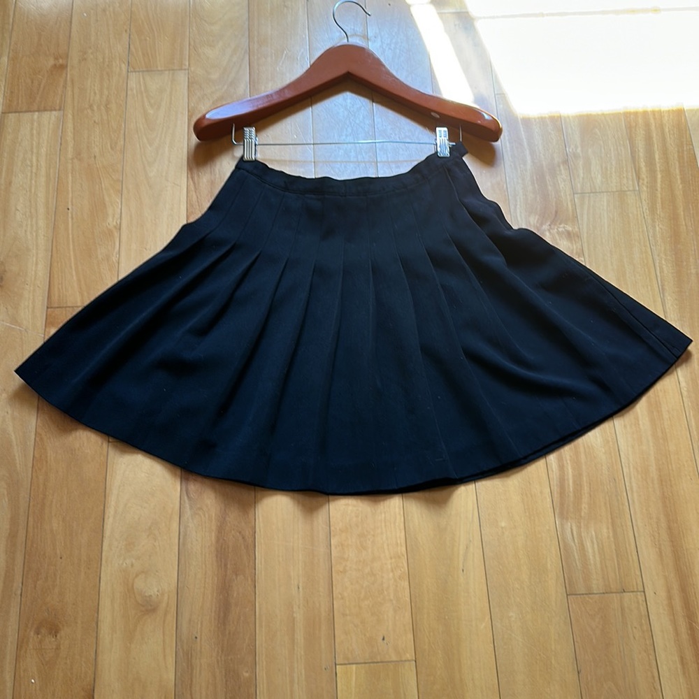 Super cute skirt cotton polyblend. Great support in tummy! Private school look.